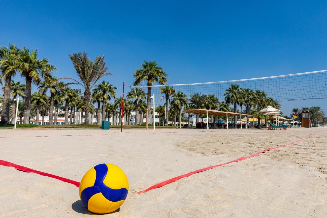 Sealine Beach, A Murwab Resort Месаид Экстерьер фото A beach volleyball court
